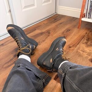 Black leather lace and zip up distressed Steve Madden boots